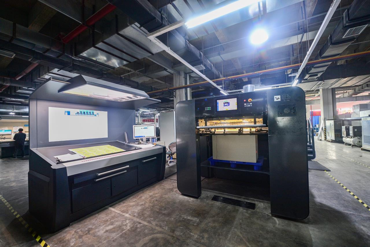 圖2重慶農商行支持的重慶某印務有限公司生產車間一角.jpg 圖2重慶農商行支持的重慶某印務有限公司生產車間一角.jpg